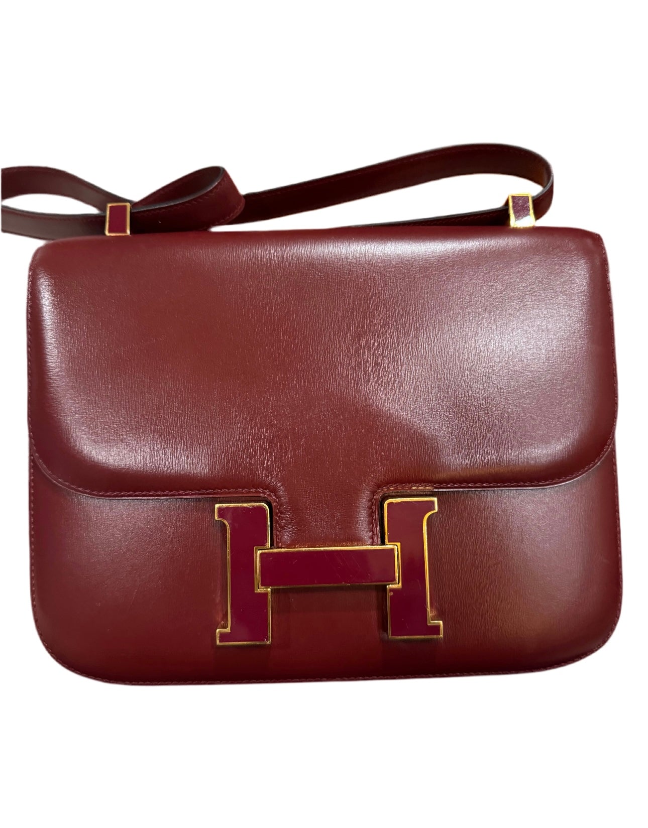 HERMES - CONSTANCE HANDBAG IN BURGUNDY BOX LEATHER . LIMITED HARDWARE