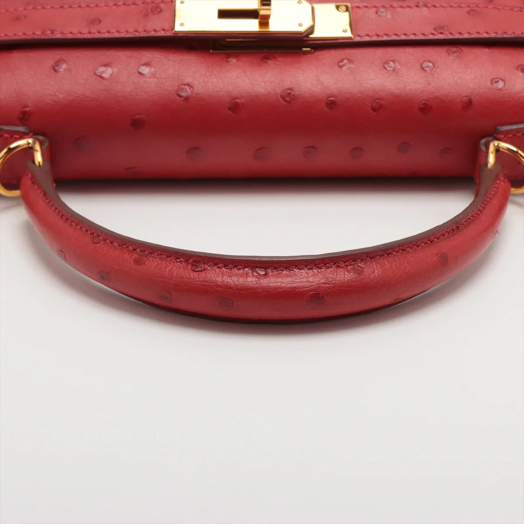 KELLY Sellier 28 Ostrich Rouge Vif Gold Hardware