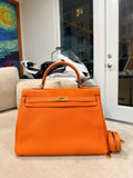Kelly Retourne 35 Orange Togo Gold Hardware