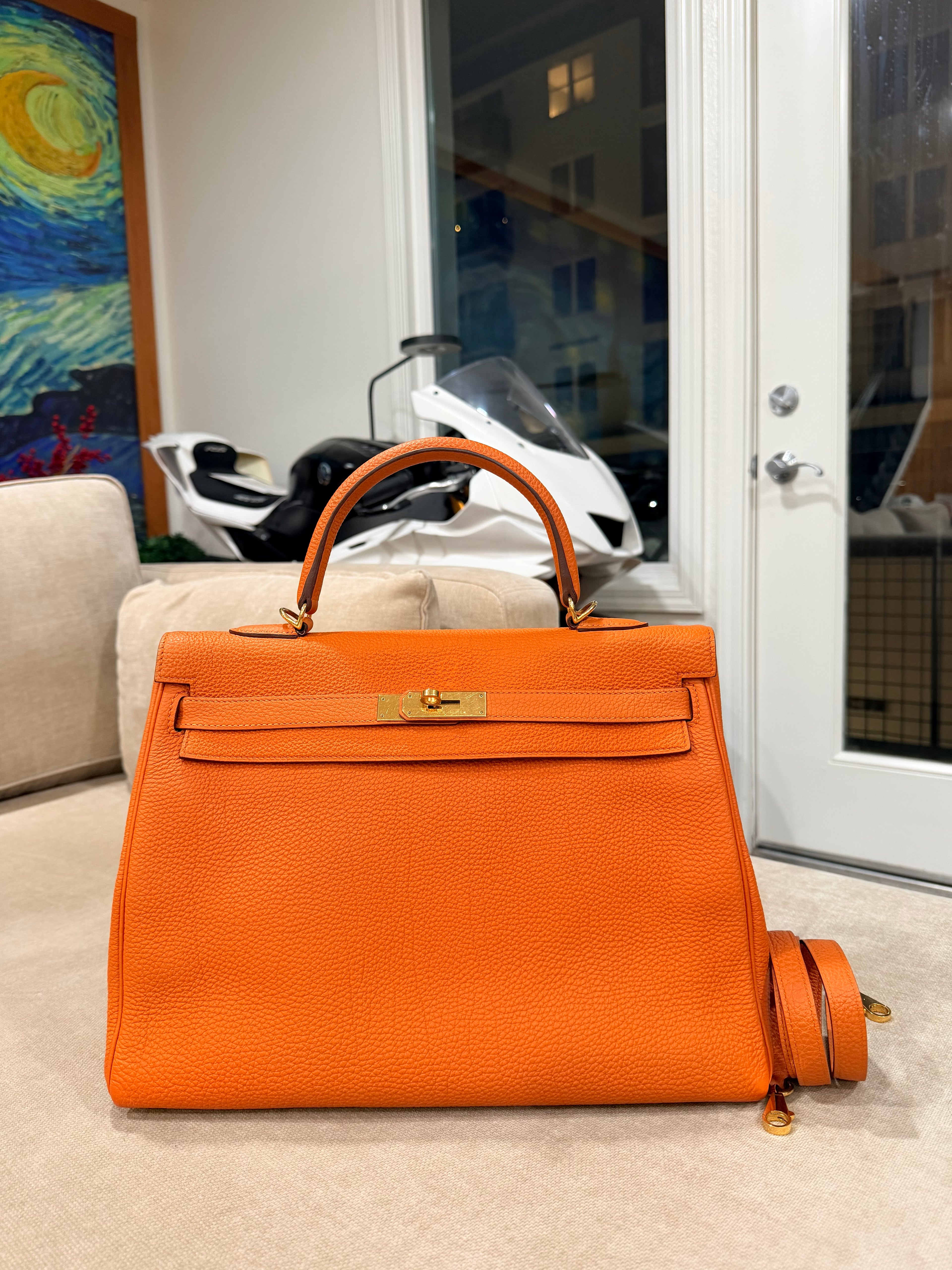 Kelly Retourne 35 Orange Togo Gold Hardware