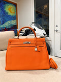Kelly Retourne 35 Orange Togo Palladium Hardware